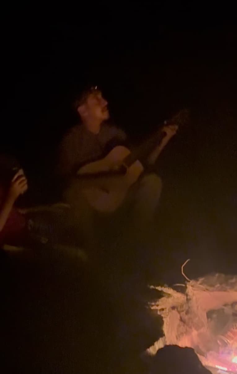 Brian serenading us to mining ballads around the campfire